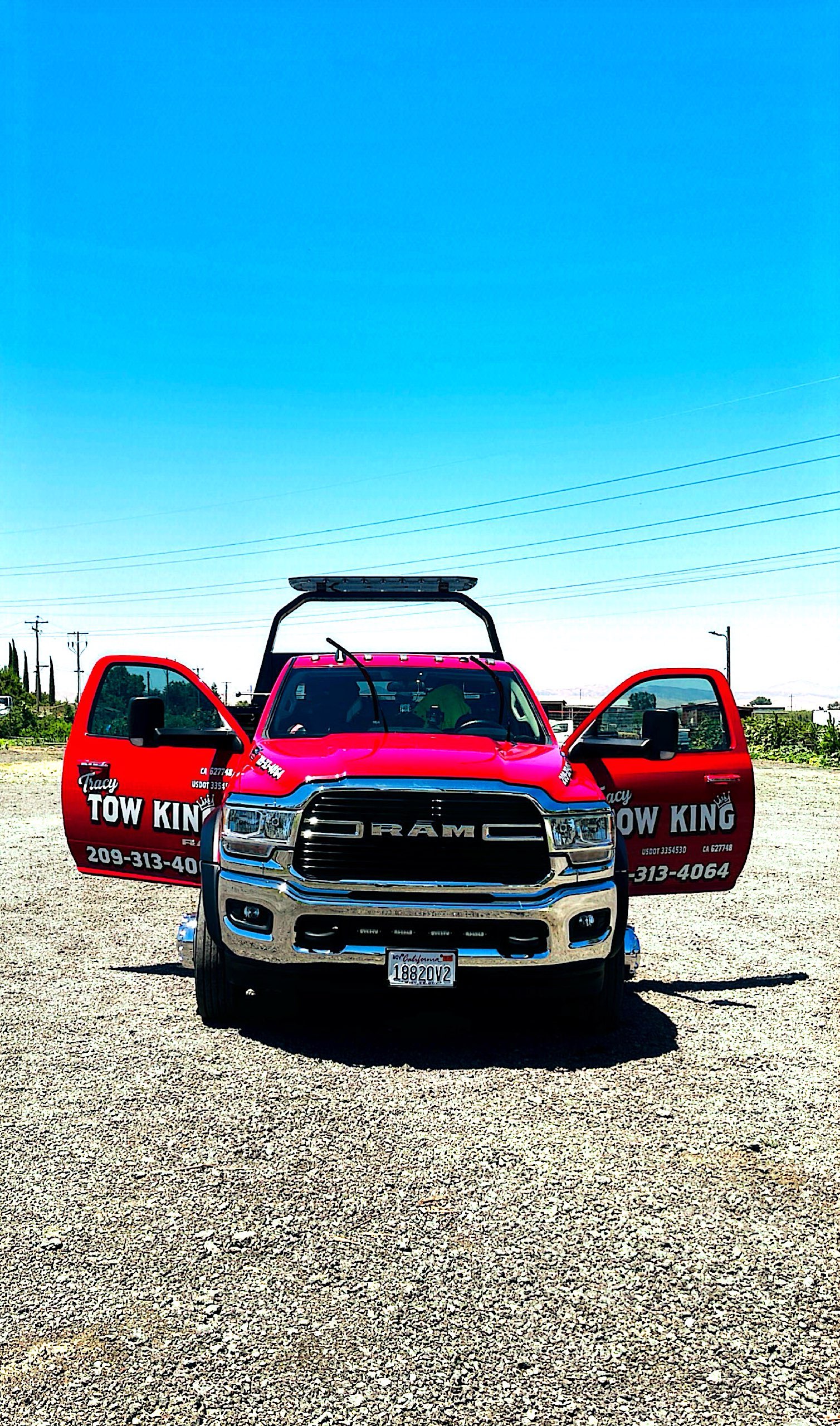 Tracy Tow King red truck
